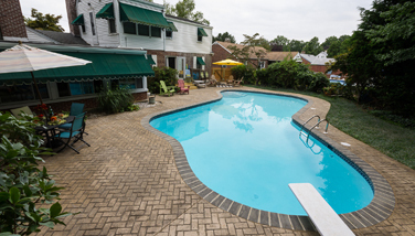 pavers over concrete pool deck